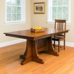 Moriss Solid Wood Dining Table styled in modern dining room with matching chairs