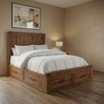 A rustic brown solid wood bed frame placed in a room. The bed features a tall headboard made of vertical wooden planks and has large, functional storage drawers built directly into the footboard with dark metal handles.